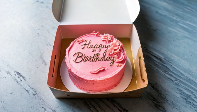 Small pastel bento cake in a takeout box with a piped message, a made-to-order small cake delivered across Los Angeles by Sweet Angeles