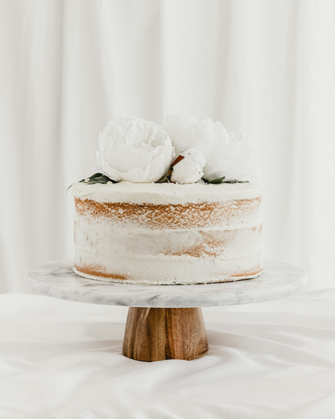 White congratulations cake in Los Angeles with clean frosting detail, ready for bold Congrats lettering to mark a promotion or new job