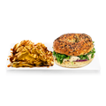 Everything bagel sandwich with arugula and chicken salad, served with chips and sauce