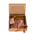 Luxury assorted chocolate bars gift box with brown ribbon, metallic and pink accents
