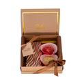 Luxury chocolate gift box with colorful chocolate bar and glitter heart truffles in gold packaging