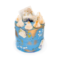 Handcrafted blue and gold cake with meringue peaks, edible flowers, and decorative pearls