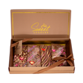 Assorted gourmet chocolate bars in a decorated gift box with heart accents and pink details