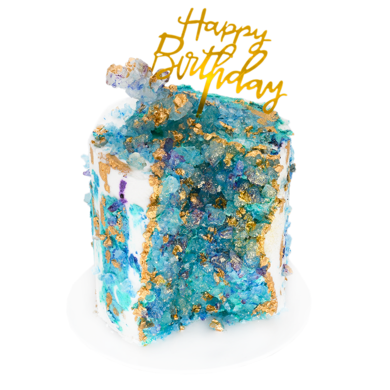 Handcrafted birthday cake with blue crystal sugar, gold accents, and Happy Birthday topper