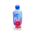 FIJI natural artesian water bottle 500ml with blue cap and hibiscus flower label on white background