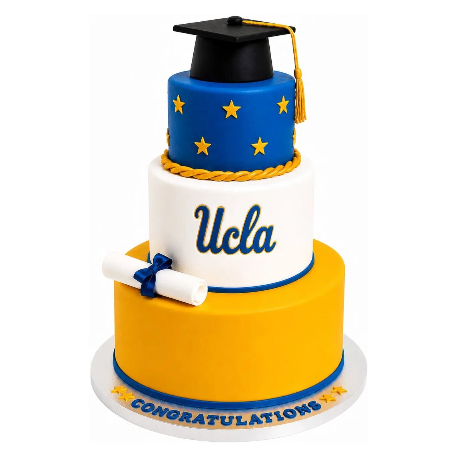 Elegant UCLA Graduation Cake – 3 Tier with blue and gold colors, topped with a black graduation cap and diploma, custom made by luxury bakery on Rodeo Drive, Beverly Hills.