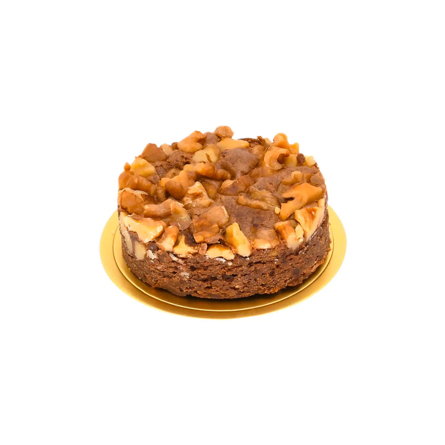 Handcrafted chocolate walnut brownie cake on a gold cake board, isolated on white background
