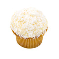 Coconut cream cheese cupcake topped with shredded coconut on white background