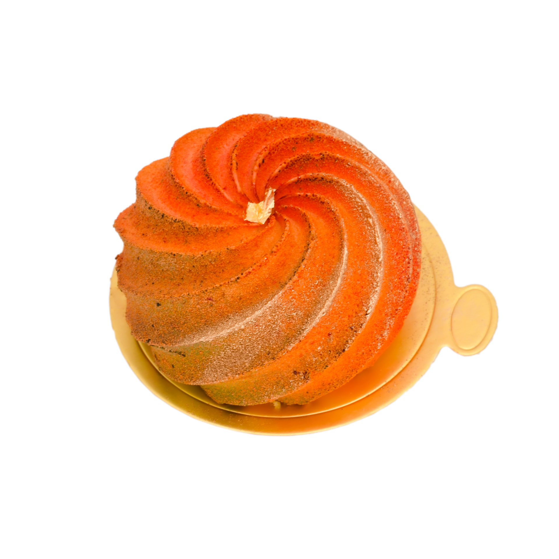 Elegant mango mousse dessert with gold dust in a spiral shape on a gold base