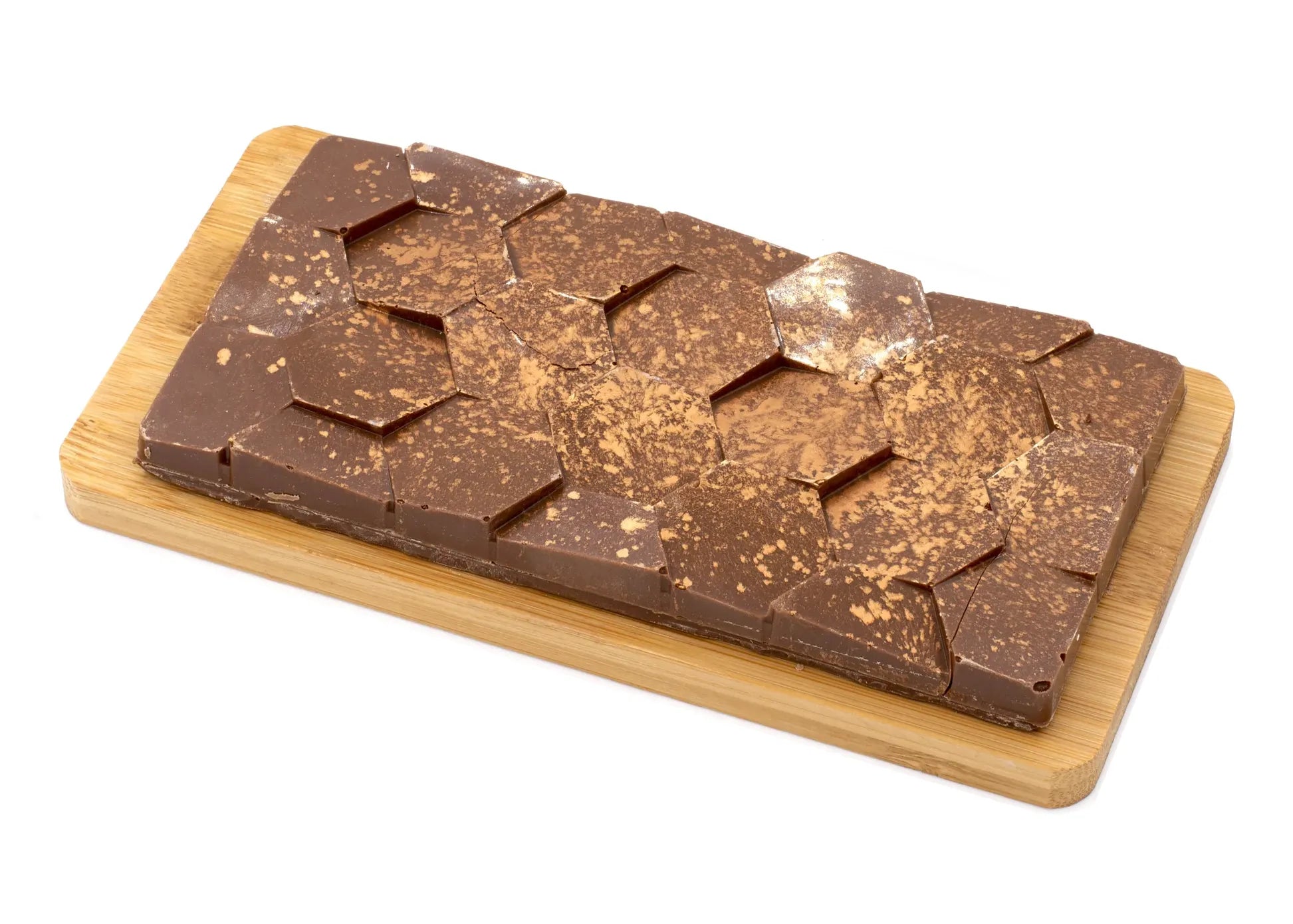 Milk chocolate bar with tiramisu dusting on wooden board, geometric pattern, gourmet dessert
