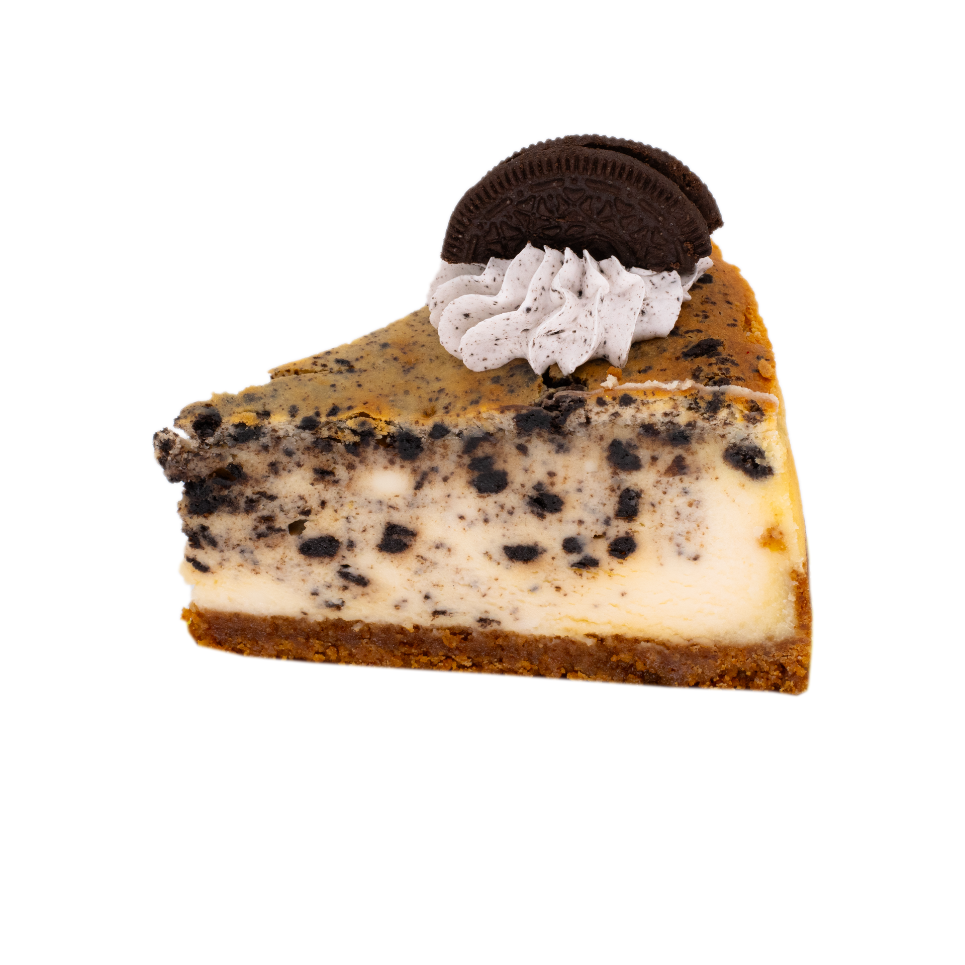 Slice of Oreo cheesecake with cookie crust and whipped cream, topped with an Oreo cookie