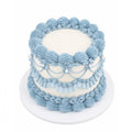 Soft Love Cake featuring elegant light blue piped frosting with pearl accents on a smooth white frosting base, perfect as a custom decorated cake for special occasions.