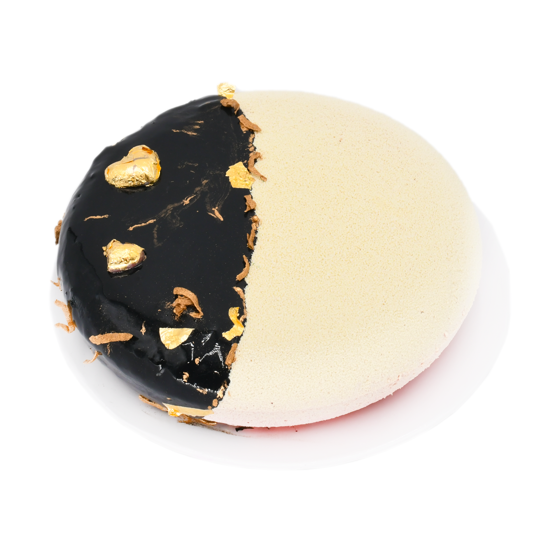 Strawberry mousse dessert with glossy chocolate glaze, gold leaf, and white velvet finish