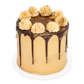 Gourmet custom cake with chocolate drip, gold accents, and piped buttercream decorations