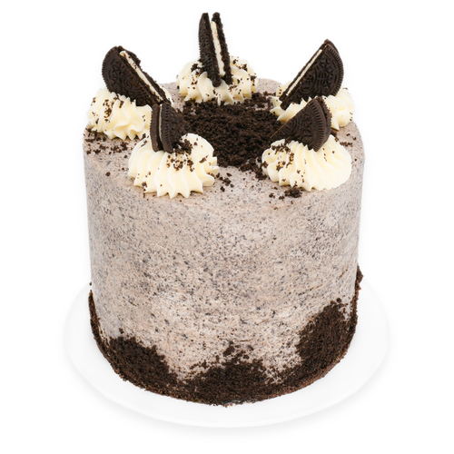 Cookies and cream cake with vanilla frosting, chocolate cookie crumbles, and cookie halves on top