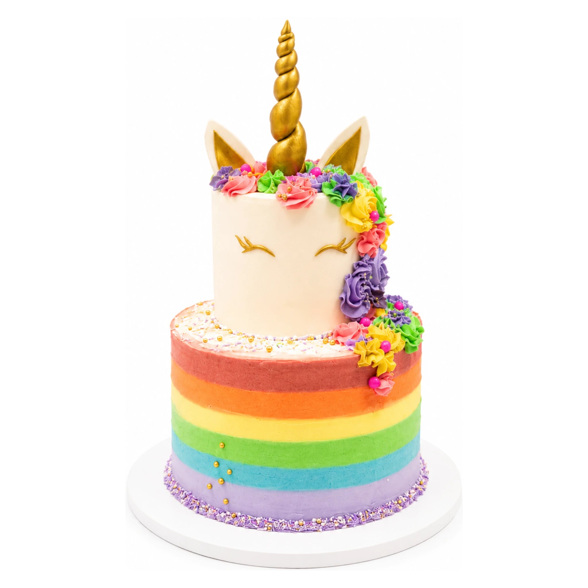 Rainbow Rosette Unicorn Cake with a gold horn and ears, decorated with colorful floral rosettes and vibrant rainbow stripes on the bottom tier, perfect for custom birthday celebrations.