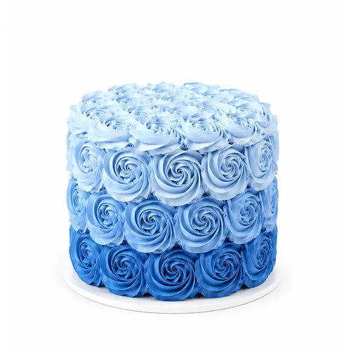 Blue Ombre Party Cake featuring intricate rosette frosting in shades of blue ombre, perfect custom birthday cake for celebrations from a Beverly Hills bakery.