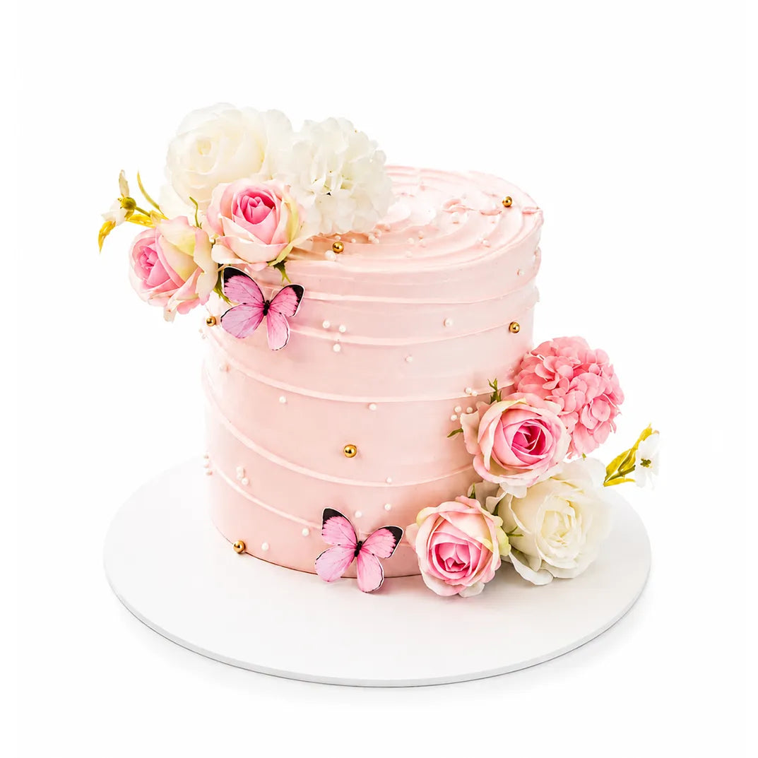 Garden Butterflies Cake with pink smooth frosting adorned with delicate pink and white roses, hydrangeas, and realistic pink butterflies, perfect for a custom birthday celebration.