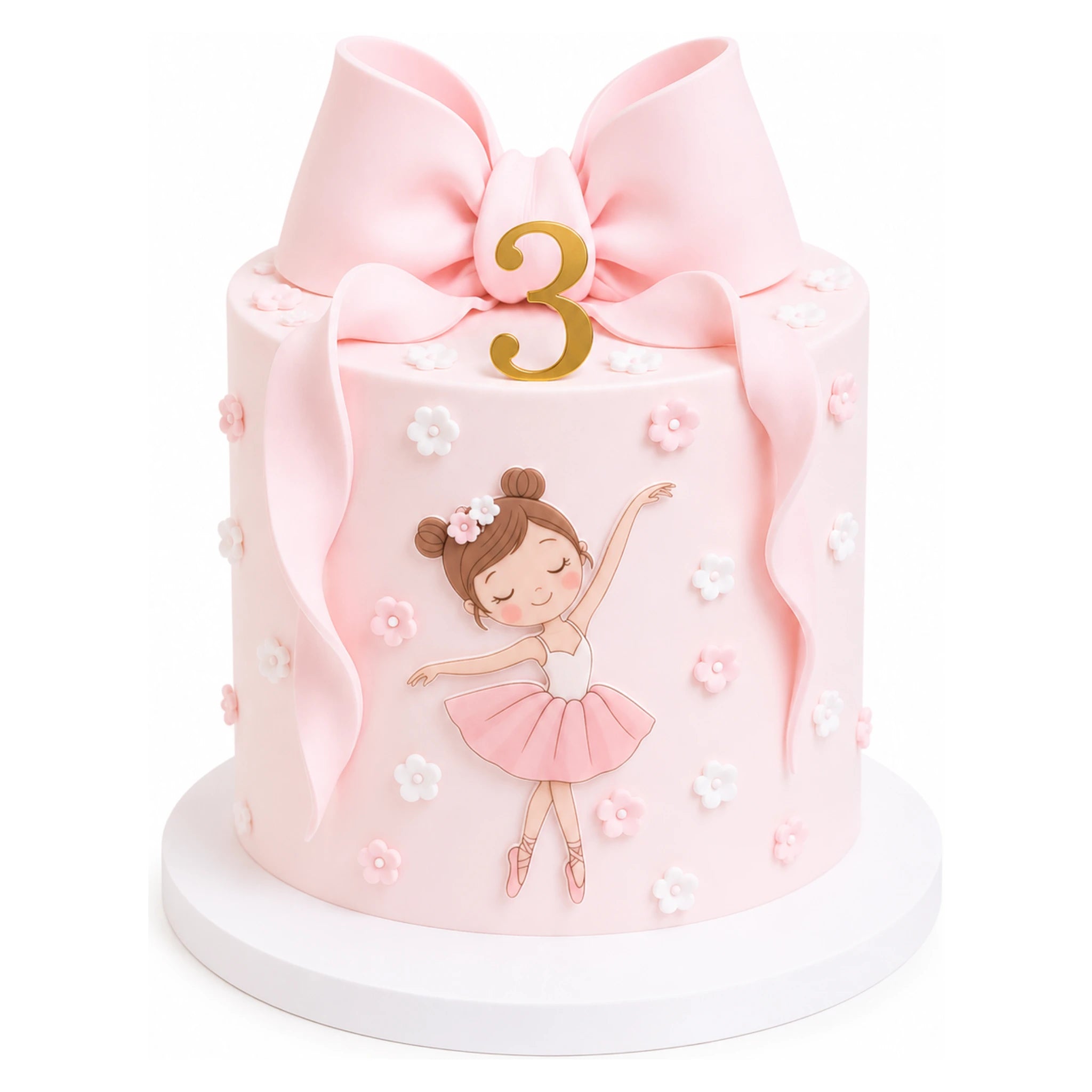 Little Ballerina Bow Cake in soft pink with a large bow on top, decorated with a dancing ballerina and small edible flowers, featuring a gold number 3 for a birthday celebration.