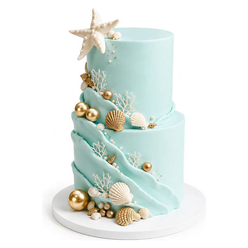 Two-tier teal ocean wave tier cake decorated with white coral, seashells, starfish, and gold spherical accents on a white cake board, custom cakes Los Angeles style.