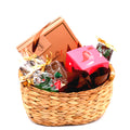 Gift basket with assorted gourmet chocolates, cookies, and bakery gift boxes