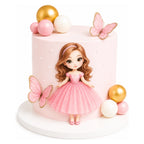 Princess Butterfly Cake featuring a light pink fondant design, decorated with a doll in a pink dress, delicate pink butterflies, and gold and white spherical accents.