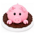Piggy Mud Cake shaped like a cute pink pig partially submerged in rich chocolate mud, crafted as a custom decorative dessert for special occasions.