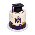 Mount St. Mary's Graduation Cake featuring a white and purple design with gold accents, topped with a black graduation cap and diploma, luxury custom cakes baked fresh in Beverly Hills.