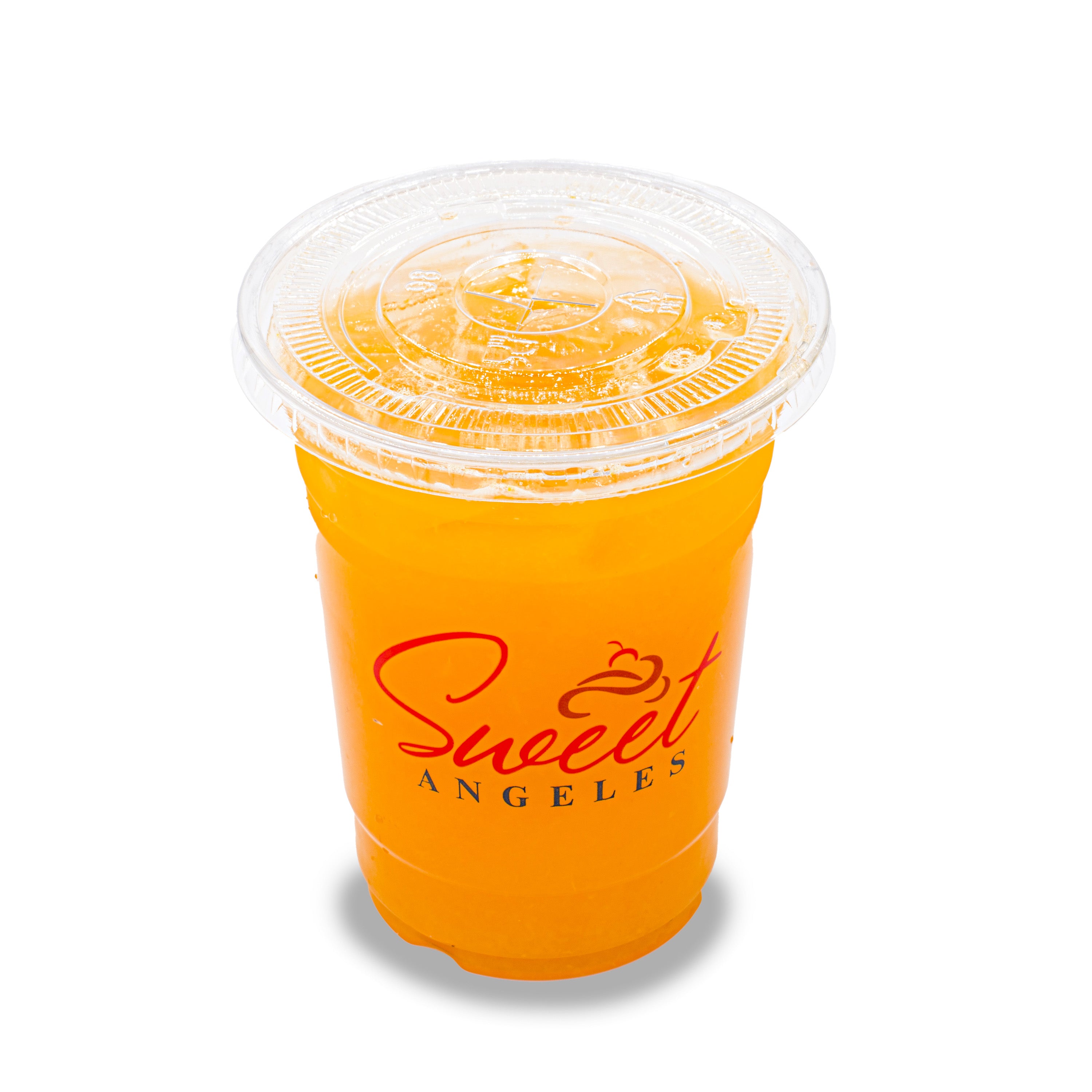 Fresh orange juice in a clear plastic cup with lid, isolated on white background