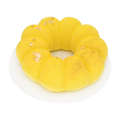 Lemon mousse cake with gold leaf and edible pearls on white plate, gourmet dessert
