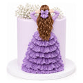 Elegant Lavender Ruffle Dress Cake featuring a detailed figure with long wavy hair and a matching purple bow, adorned with delicate white flowers on top.