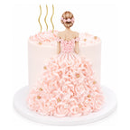 Balloon Girl Cake featuring an elegant pink dress design with detailed floral frosting and gold accents, showcasing a figurine in a delicate updo hairstyle.