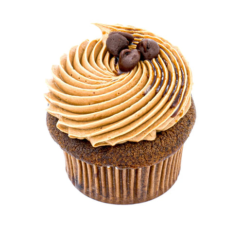 Chocolate cupcake with swirled mocha frosting and chocolate chips on white background