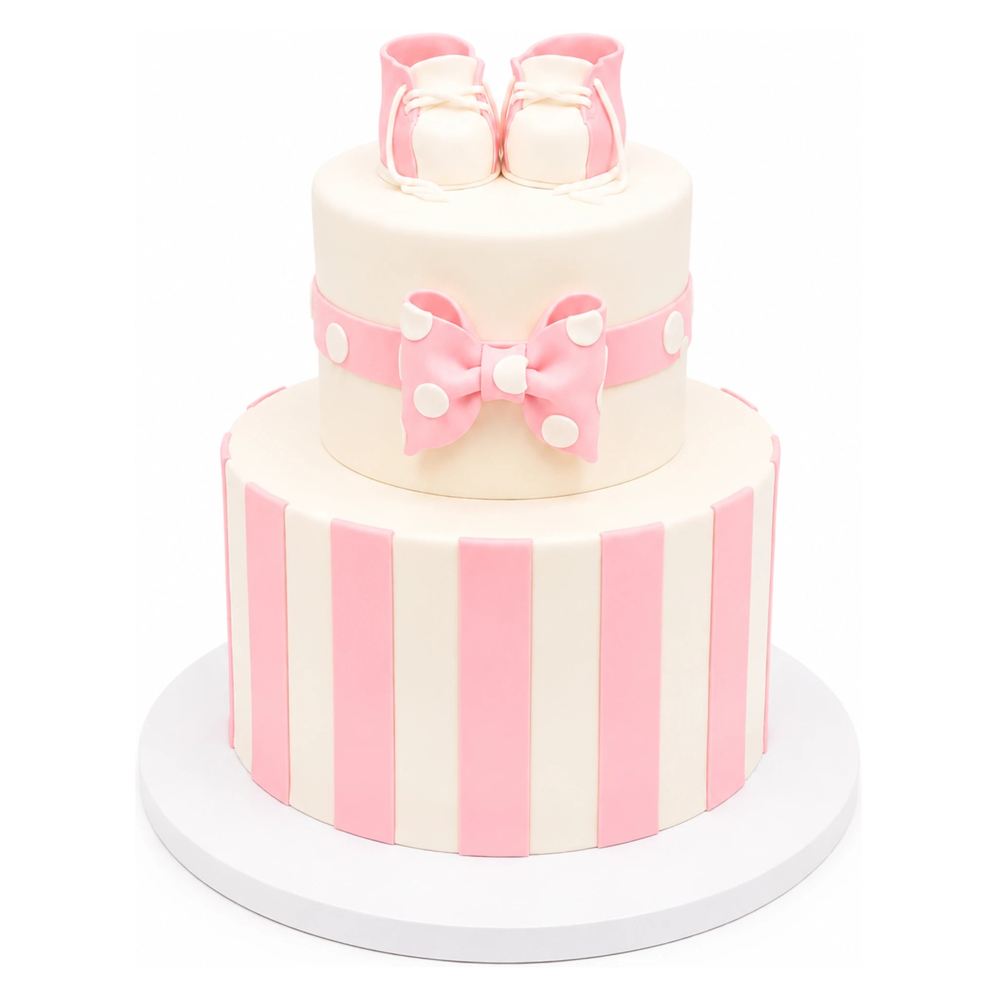 Two-tier custom cake decorated with vertical pink and white stripes, a pink bow with white polka dots, and topped with pink stripe baby booties cake accents.
